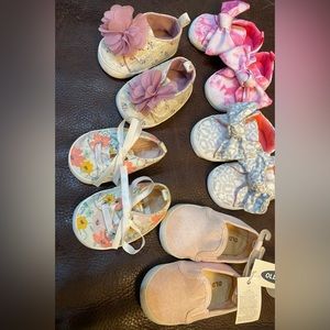 5 pairs of new or like new infant shoes